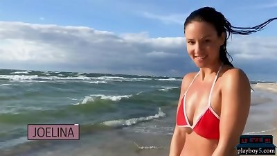 German mom model Joelina strips bare on the beach